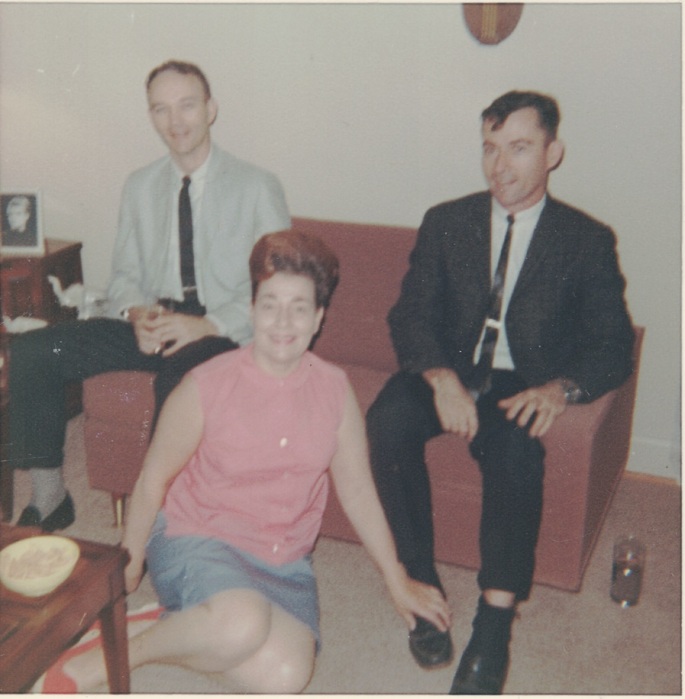 l to r: Mike Collins (Apollo 11), Myrtle "Jay" Jenzano, and John Young (Apollo 16) in the Jenzano living room, ca. 1964. Image courtesy of Carol Jenzano, copyright 2018.